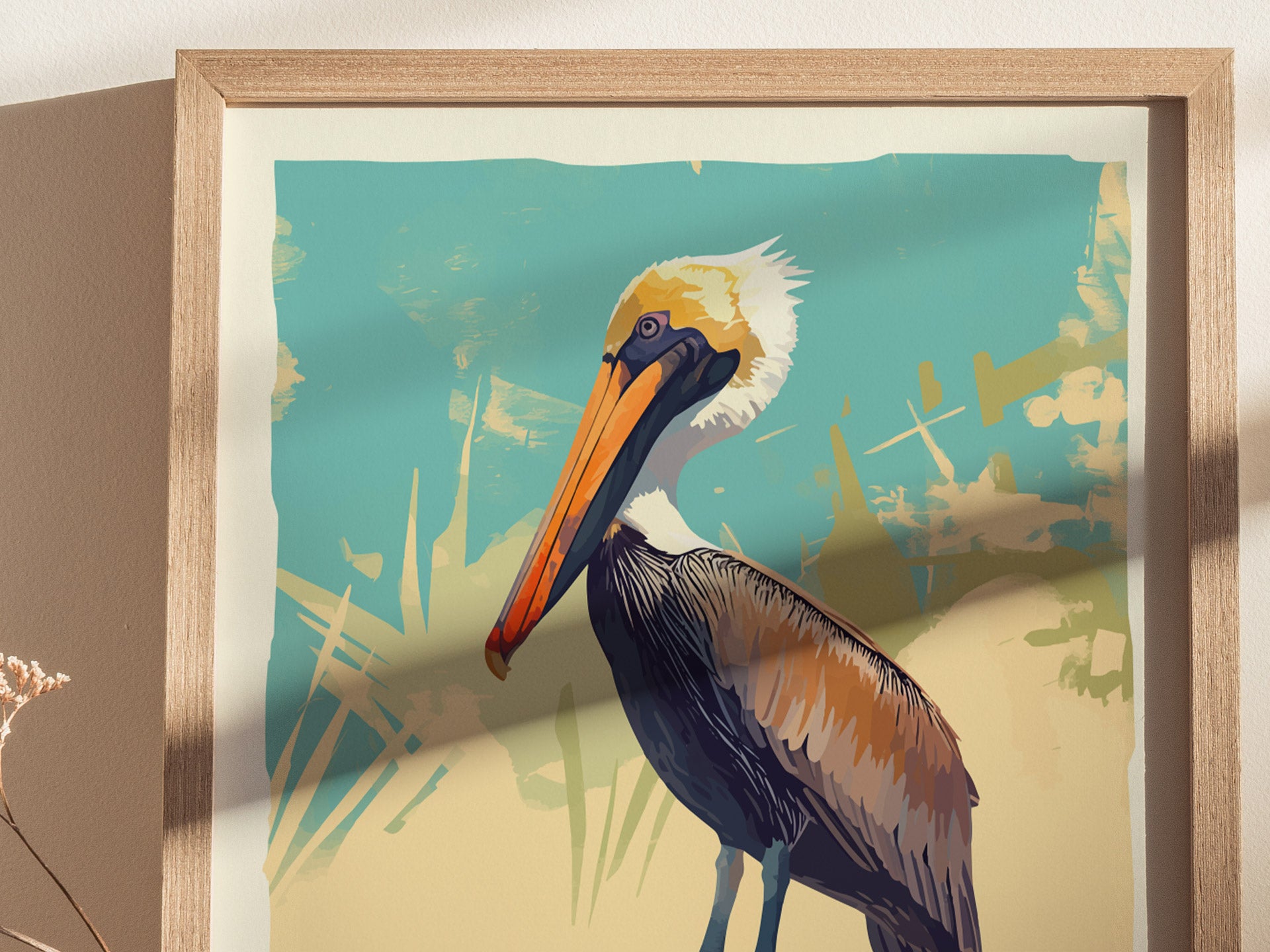 A framed poster features an illustrated brown pelican with a colorful background, showcasing blue, orange, and beige hues. The artwork captures the essence of coastal wildlife.