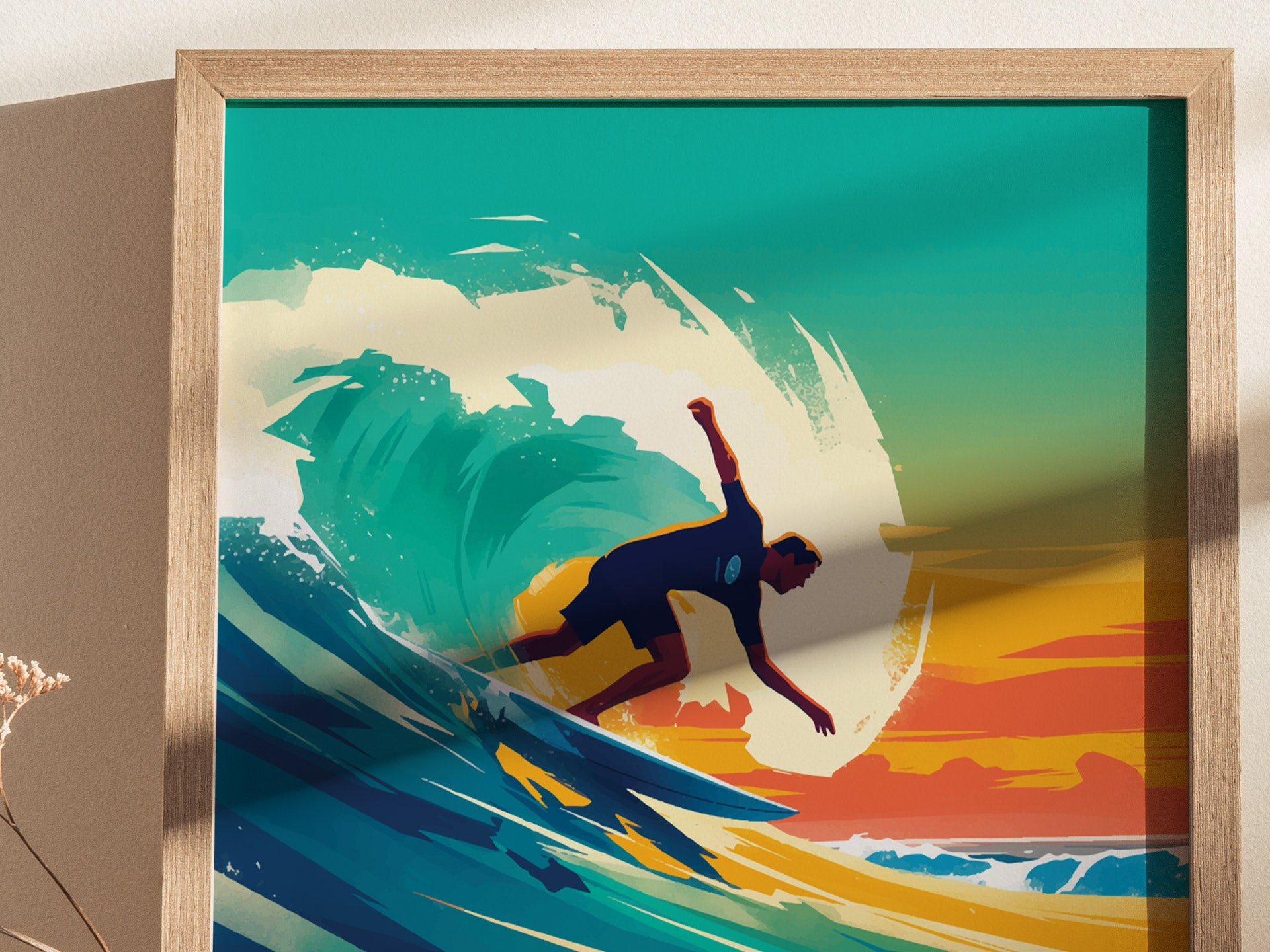 A vibrant poster features a surfer riding a powerful wave, set against a backdrop of a colorful sunset with teal, orange, and yellow hues. The artwork is framed in wood.