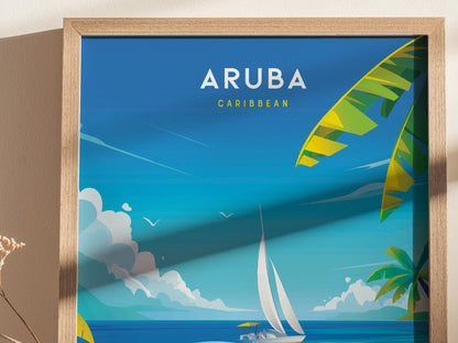 A vibrant poster titled Aruba Caribbean features a sailboat on turquoise waters with palm leaves and fluffy clouds, framed in light wood.