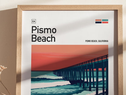 Framed Pismo Beach poster featuring a stylized pier silhouette against a vibrant red and blue sunset backdrop. The artwork includes bold text reading Pismo Beach, California and minimalist design elements.