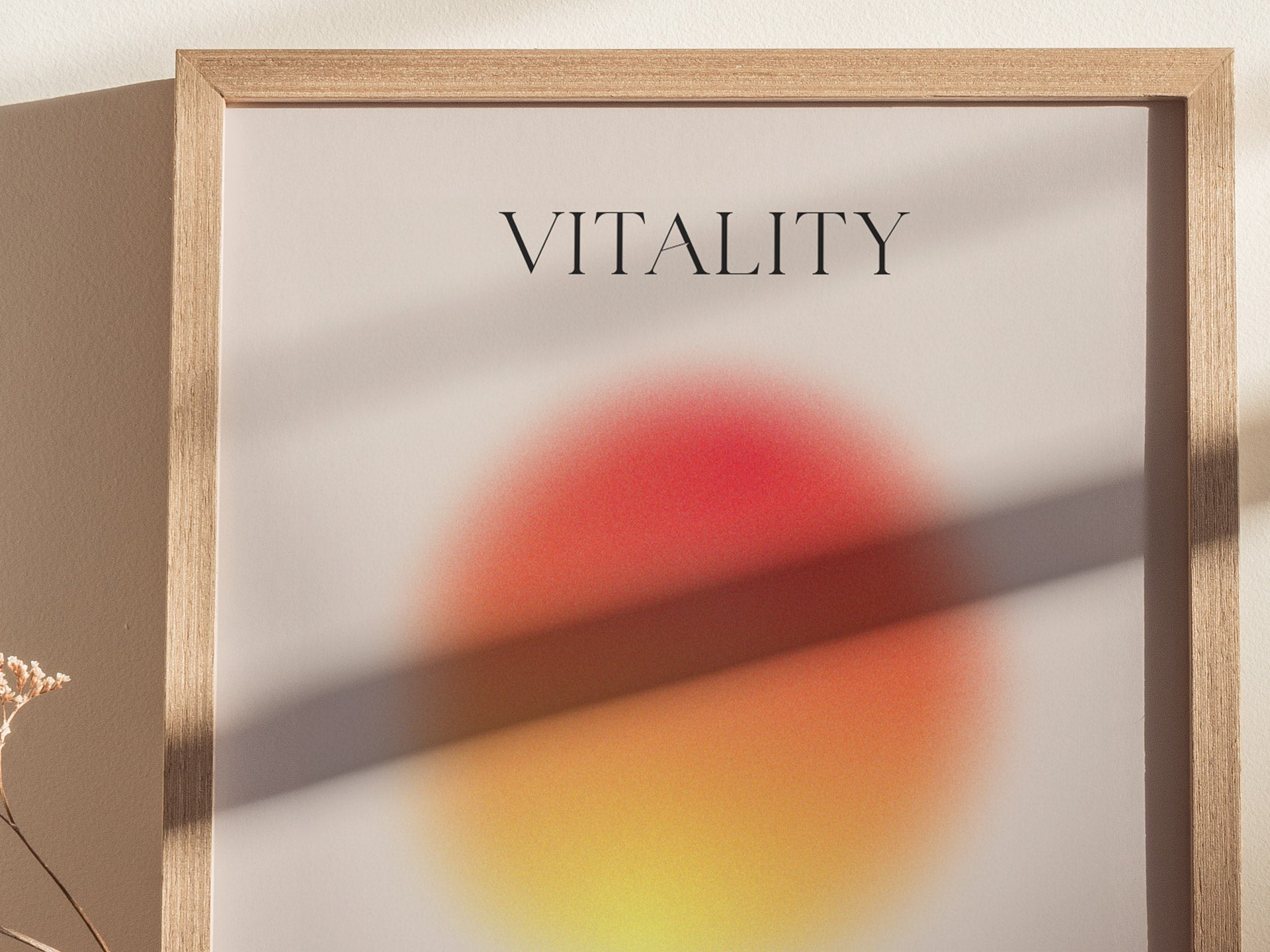 Framed artwork with the word 'VITALITY' on a light background