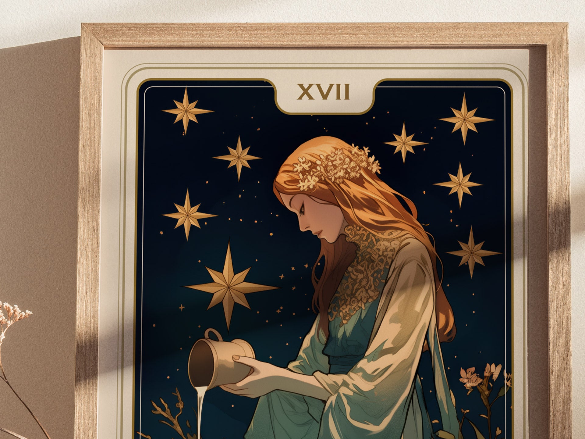 A framed poster depicts a serene woman with flowing hair and a floral crown, pouring water beneath golden stars against a dark background. The Roman numeral XVII is displayed above.
