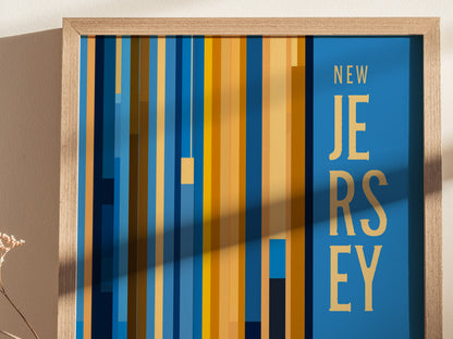 A New Jersey poster features vertical stripes in shades of blue, orange, and yellow with the text New Jersey in bold. A wooden frame surrounds the artwork.