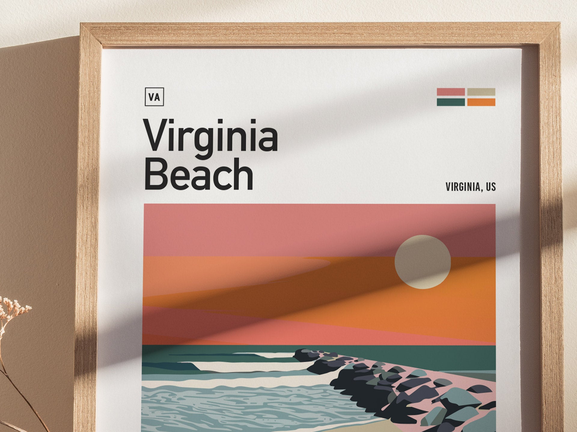 Framed poster featuring a stylized illustration of Virginia Beach with a sunset over the ocean and a rocky jetty. The text reads Virginia Beach, Virginia, US.