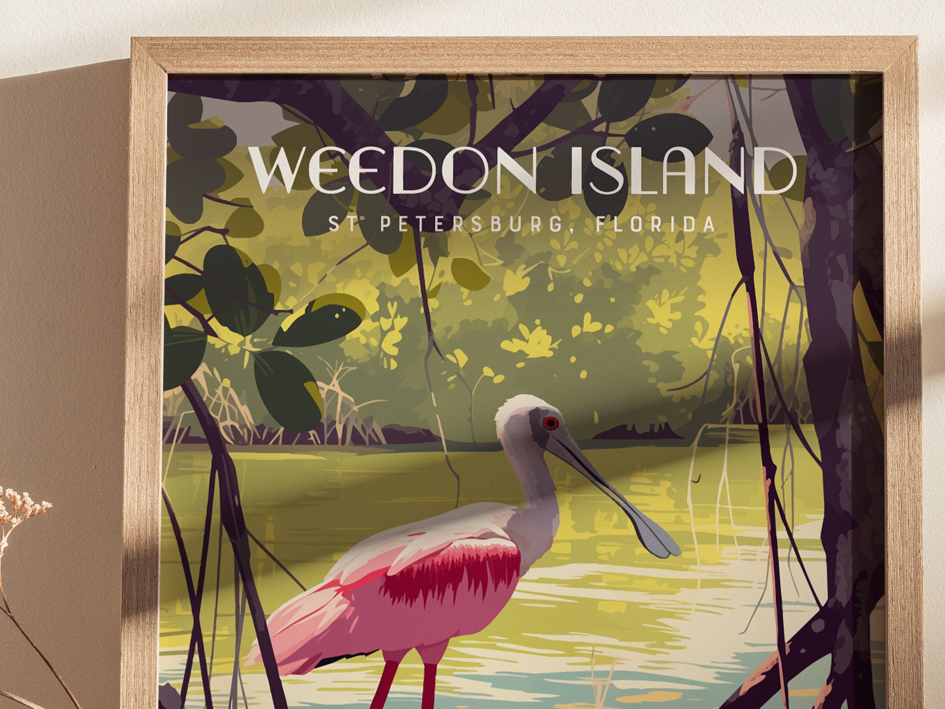 Illustrated poster of Weedon Island in St. Petersburg, Florida, featuring a pink Roseate Spoonbill in a mangrove setting with lush green foliage and tranquil water.