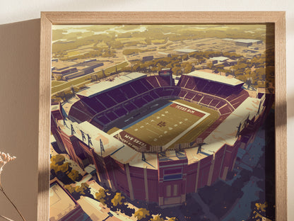 A framed artwork of Kyle Field, Texas A&Ms iconic stadium, showcasing its vast seating and field from an aerial perspective, with surrounding landscape details.