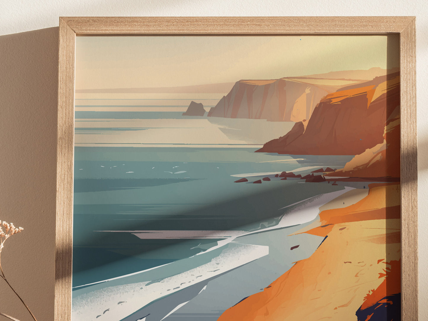 Framed poster depicting a stylized coastal landscape with dramatic sea cliffs and a sandy shoreline under a soft, pastel sky. The artwork captures a serene ocean view.