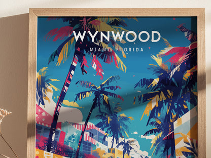A vibrant poster showcasing a colorful depiction of palm trees against a blue sky, with the words Wynwood Miami Florida at the top. The artwork features bold, abstract patterns and bright colors, capturing a lively, tropical vibe.