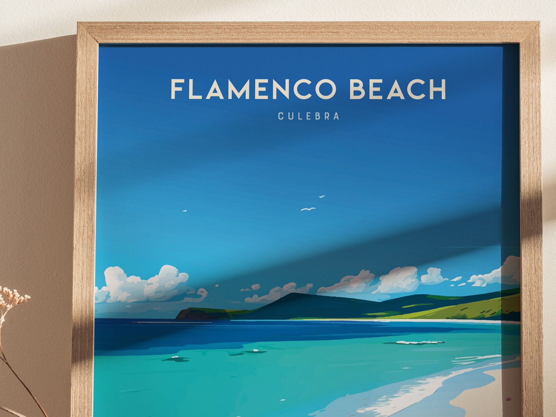 Framed artwork of Flamenco Beach, Culebra, featuring turquoise waters, white sand, and a clear blue sky with light clouds. The poster is set against a neutral wall background.
