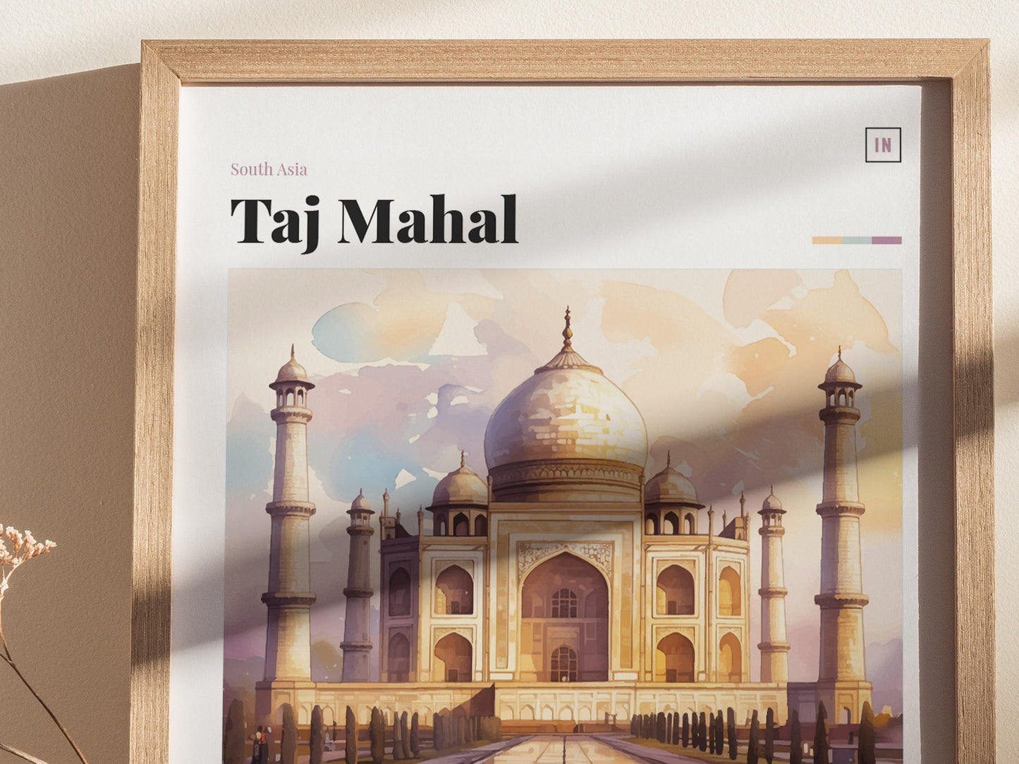 Framed poster of the Taj Mahal featuring a watercolor illustration with warm tones and intricate architectural details. The poster is titled Taj Mahal and is set against a neutral wall.
