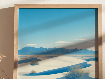 Framed artwork depicting White Sands National Park with rolling white dunes and distant blue mountains under a clear sky. Sunlight casts a shadow on the image, creating a serene atmosphere.