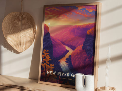 A framed poster of New River Gorge, featuring a colorful landscape with a winding river, sits on a shelf next to a wicker fan, candle, and ceramic vase.