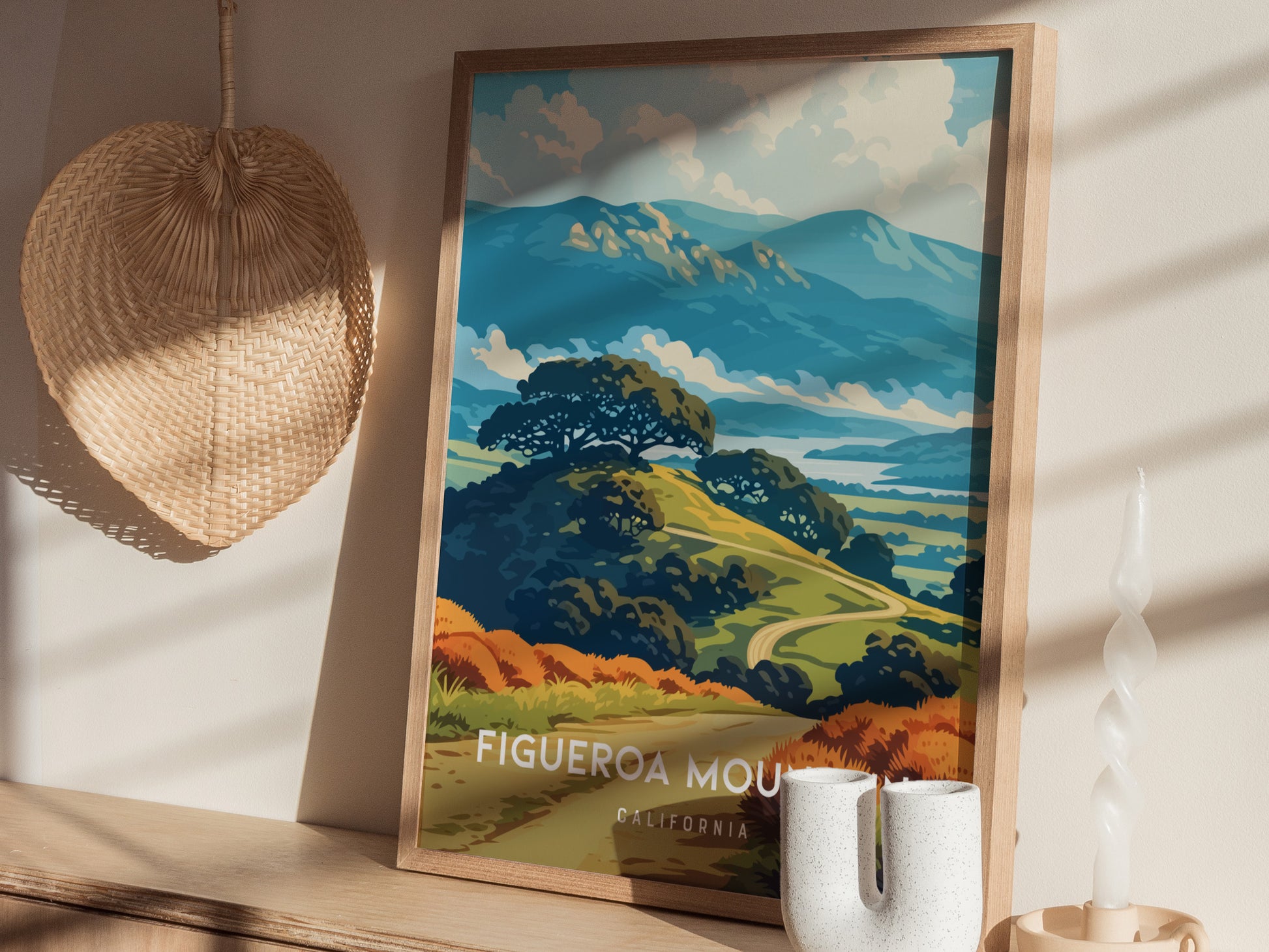 A framed poster depicting a picturesque view of Figueroa Mountain in California, showcasing rolling hills adorned with vibrant green and orange landscapes under a blue sky with fluffy clouds.