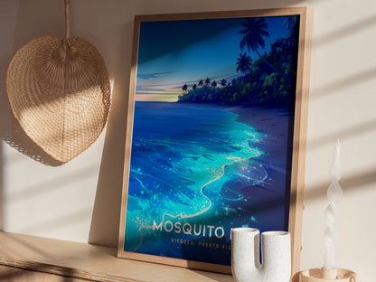 A framed poster titled Mosquito showcases a vibrant beach scene in Vieques, Puerto Rico, featuring a luminous shoreline illuminated by soft blue and turquoise waves under a twilight sky.