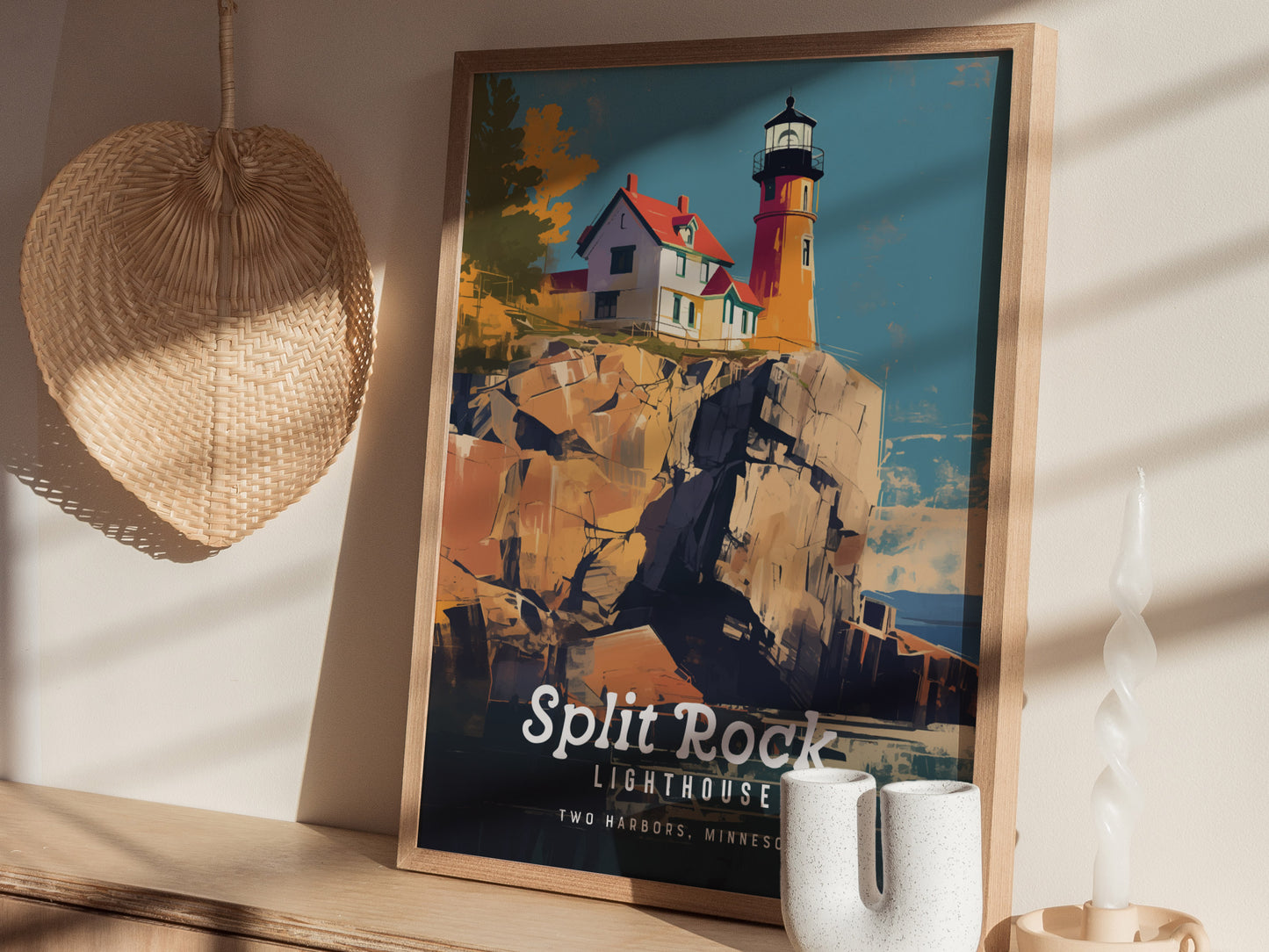 A framed poster of Split Rock Lighthouse sits on a wooden shelf, with sunlight casting shadows and a woven basket hanging nearby.