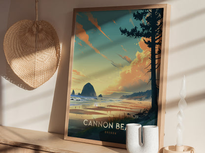 Framed poster of Cannon Beach, Oregon featuring Haystack Rock and a vibrant sunset, displayed on a shelf with a woven basket and decorative candle nearby.