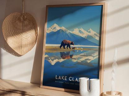 Framed poster of Lake Clark National Park featuring a bear and cubs by a reflective lake, with mountains in the background.