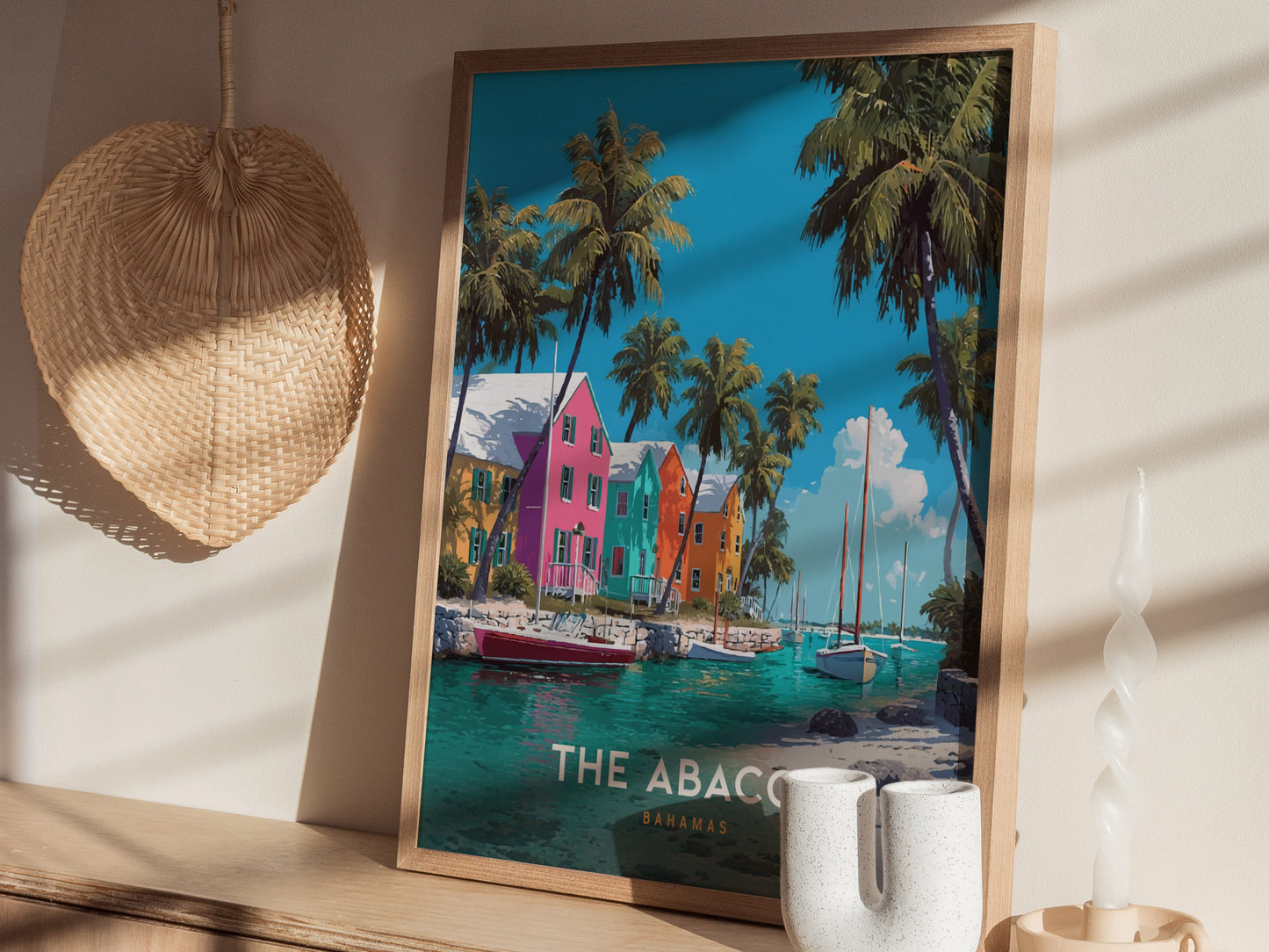 A vibrant travel poster featuring colorful buildings in shades of pink, yellow, and green along a serene waterfront in the Bahamas. Palm trees sway in the foreground, while boats are moored in the turquoise water under a bright blue sky.