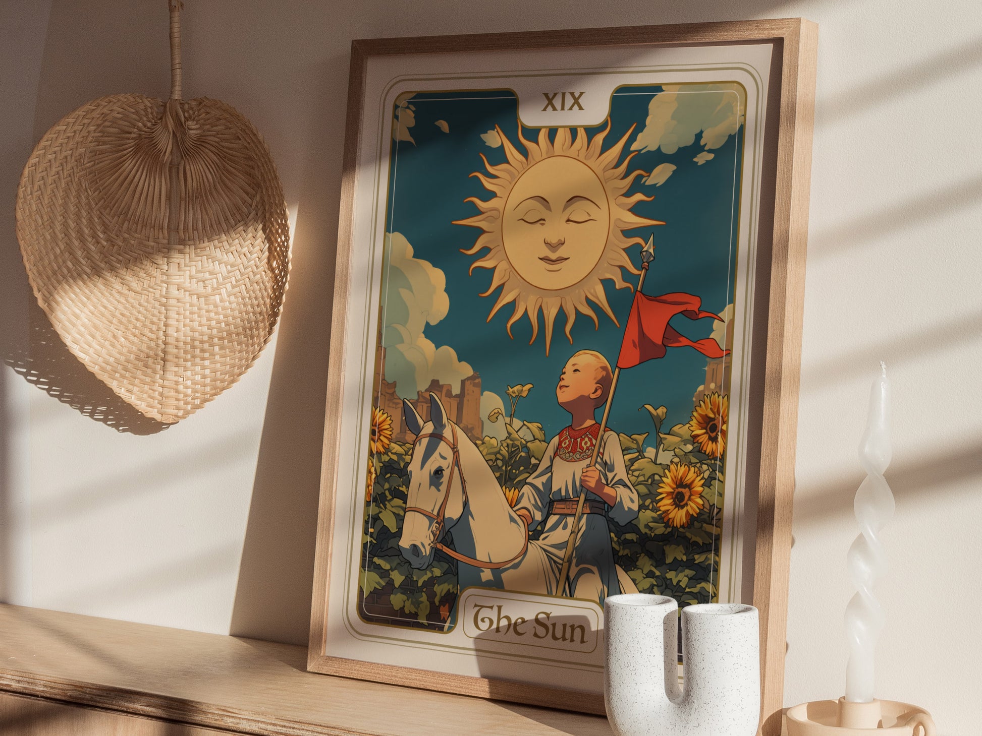 A framed tarot card poster of The Sun features a child on a white horse, surrounded by sunflowers under a radiant sun. Decorative items and shadows enhance the scene.