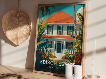 A framed poster of a colorful house surrounded by lush greenery is displayed on a wooden shelf. A woven decorative piece hangs on the wall beside it.