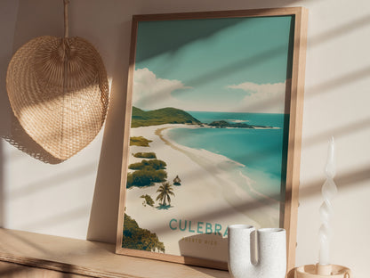 A framed poster of Culebra, Puerto Rico, featuring a tropical beach scene with turquoise waters and lush greenery, is displayed on a wooden shelf alongside a straw hat and decorative.