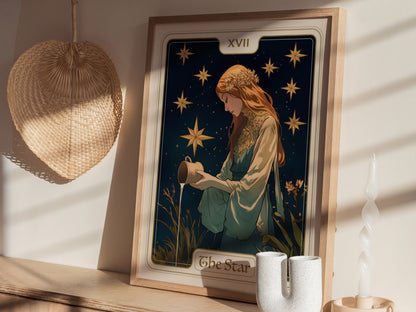 A framed Star Tarot poster depicting a serene maiden pouring water under eight-pointed stars is displayed on a shelf, surrounded by a basket and decorative candles.