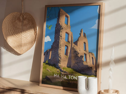 A framed poster of Ha Ha Tonka State Park, Missouri, depicts a stone castle ruin under a blue sky. It leans against a wall next to a woven fan and.