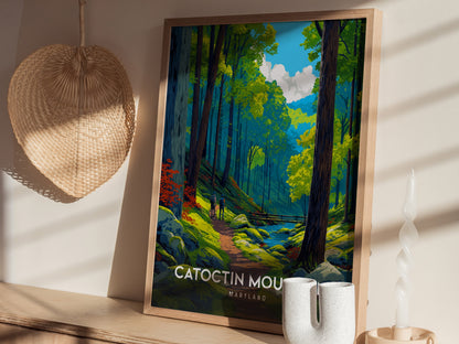 A framed art print features a vibrant forest scene in Catoctin Mountain, Maryland, showcasing tall green trees, a winding stream, and a couple walking along a path.