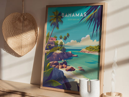 A framed Bahamas travel print features a tropical landscape with palm trees, turquoise waters, and rocky shores, set on a wooden shelf next to a woven fan and candle.