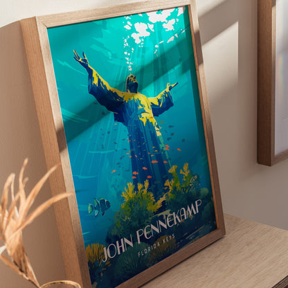 A framed poster depicts an underwater scene with a statue raising its arms, surrounded by colorful fish and corals, labeled John Pennekamp Florida Keys.