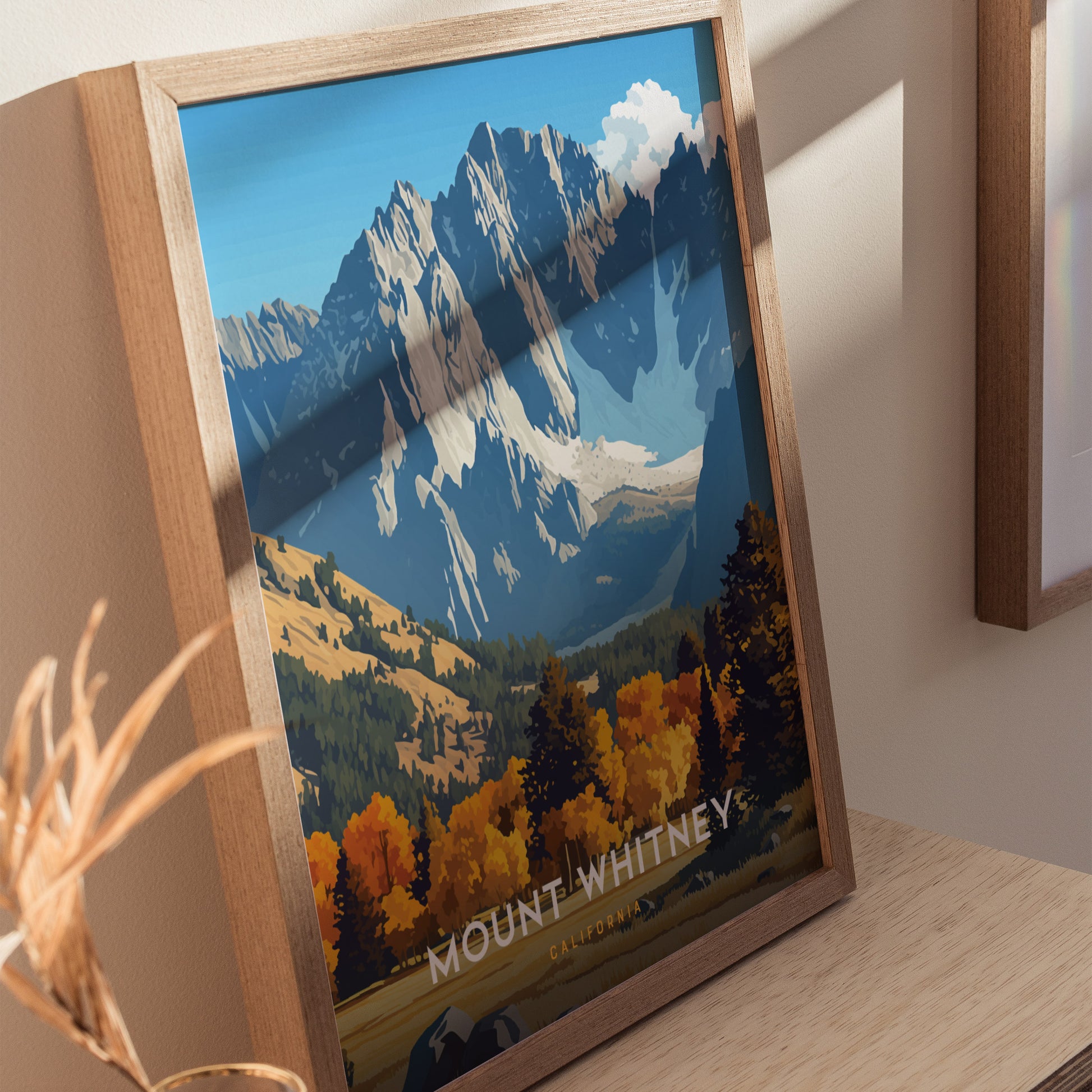 Framed poster of Mount Whitney featuring dramatic granite peaks, colorful autumn foliage, and a clear blue sky.
