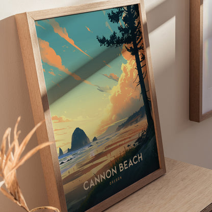 A framed poster of Cannon Beach, Oregon, features a vibrant sunset over the ocean with Haystack Rock and silhouettes of trees. It rests on a light wooden surface.