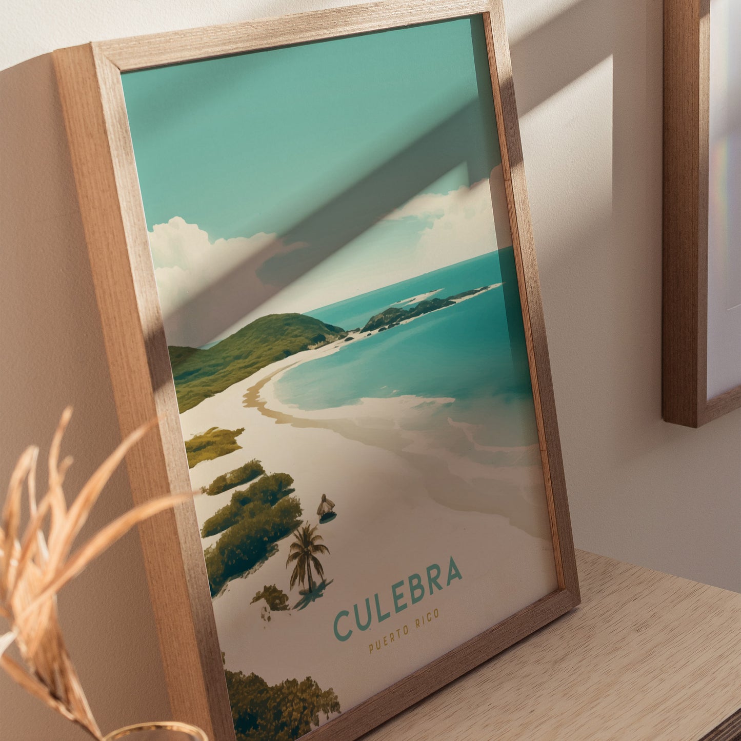 A framed poster depicting a serene tropical beach scene with turquoise waters and lush greenery, labeled Culebra Puerto Rico.