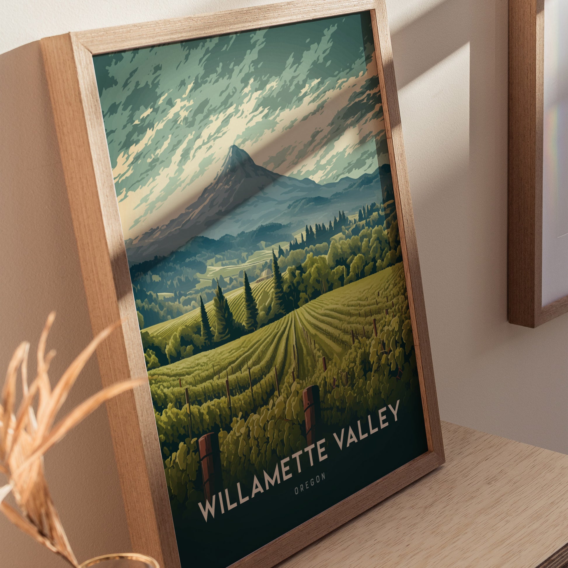 Framed poster depicting the Willamette Valley with lush vineyards, rolling hills, and a prominent mountain under a dynamic sky. Text reads Willamette Valley, Oregon.