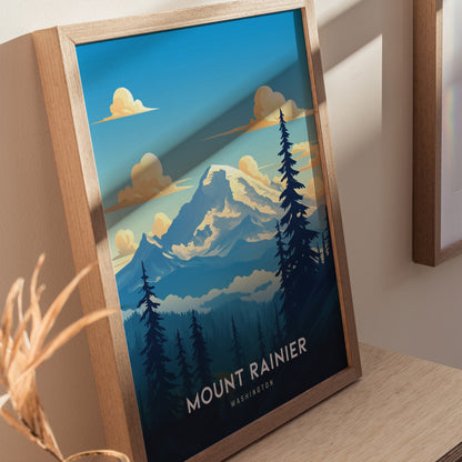 Framed artwork depicting Mount Rainier with a glaciated summit and surrounding pine trees under a blue sky. The text Mount Rainier Washington is visible at the bottom.
