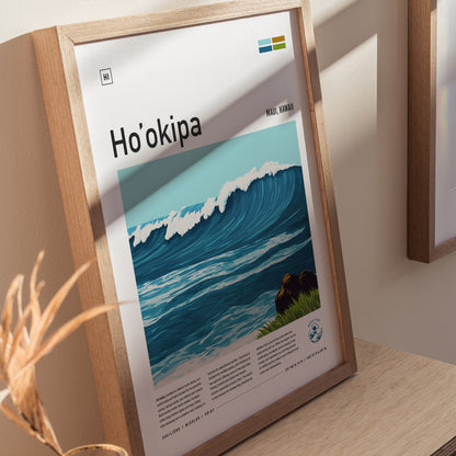 Framed poster featuring an illustrated wave at Hookipa Beach, Maui. The artwork is placed on a wooden surface, with natural light casting shadows around it.