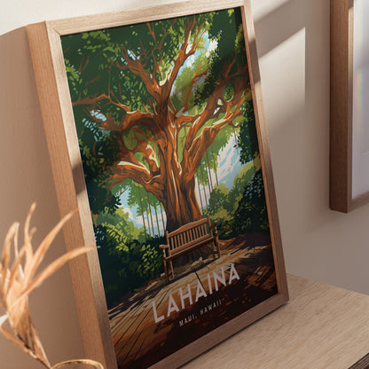 Framed poster of a vibrant banyan tree with a wooden bench underneath, labeled Lahaina, Maui, Hawaii. The artwork is displayed on a wooden surface, casting soft shadows.