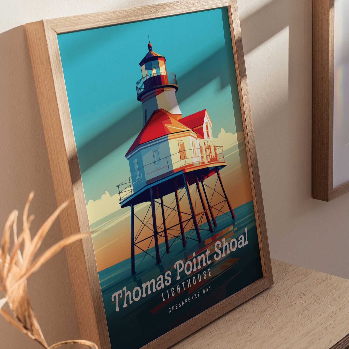 Framed poster of Thomas Point Shoal Lighthouse with a vibrant, colorful design. The artwork highlights the lighthouse on stilts against a blue sky, celebrating Chesapeake Bays maritime heritage.