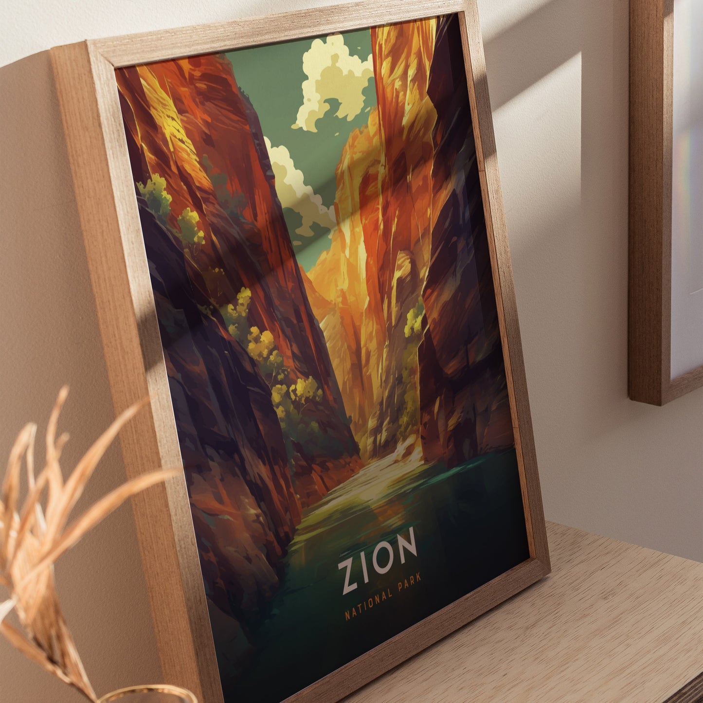 Framed poster of Zion National Park featuring vibrant red rock cliffs and a serene river under a blue sky with clouds.