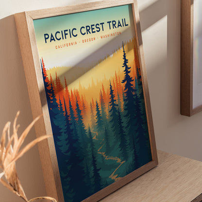 Framed Pacific Crest Trail poster featuring a colorful, stylized forest landscape with a winding path.