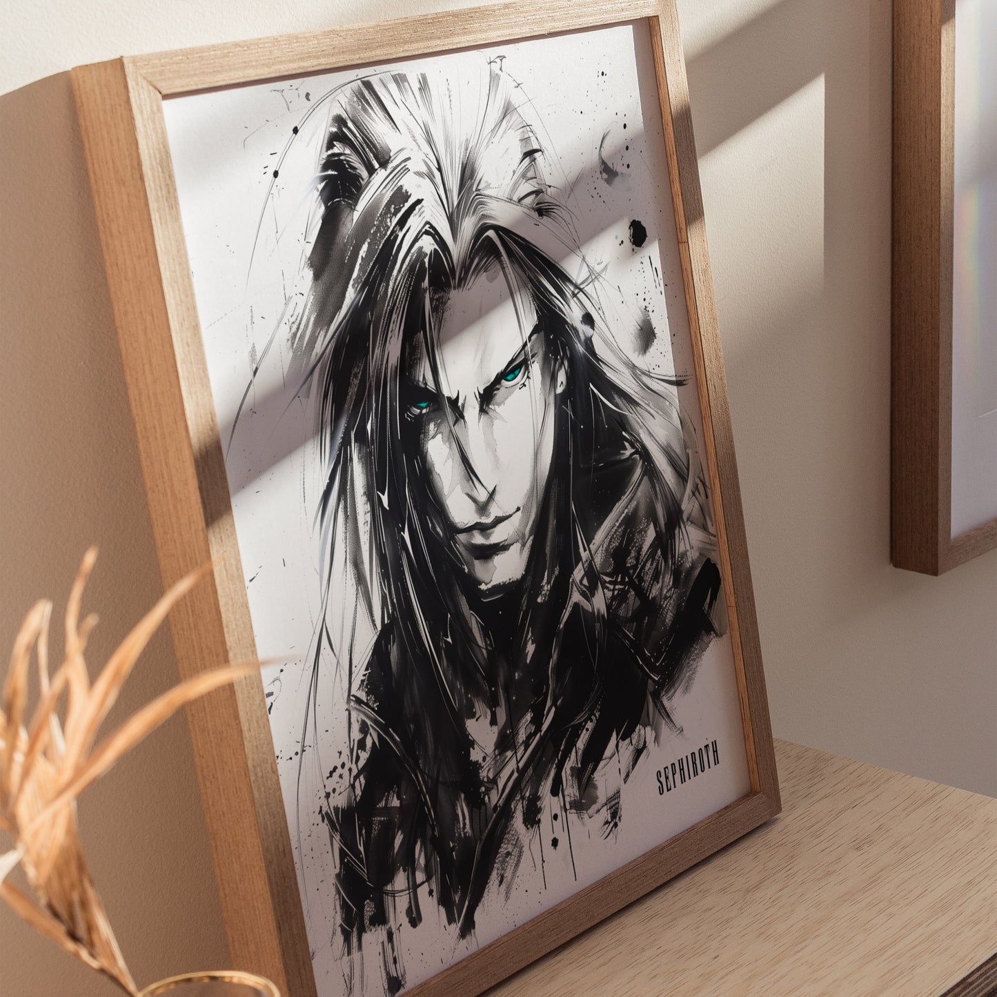A framed black and white poster of Sephiroth from Final Fantasy VII, showcasing his intense gaze and long silver hair, with a shadow cast across the artwork.