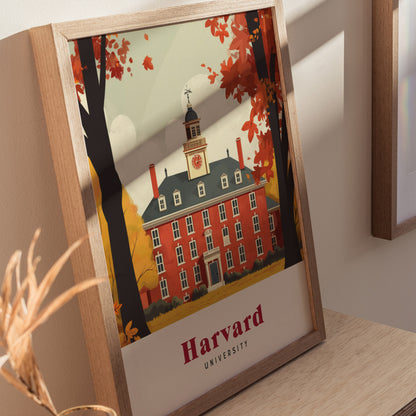 A framed poster features an illustrated Harvard University building with autumn leaves, set against a soft background. The text Harvard University is prominently displayed at the bottom.