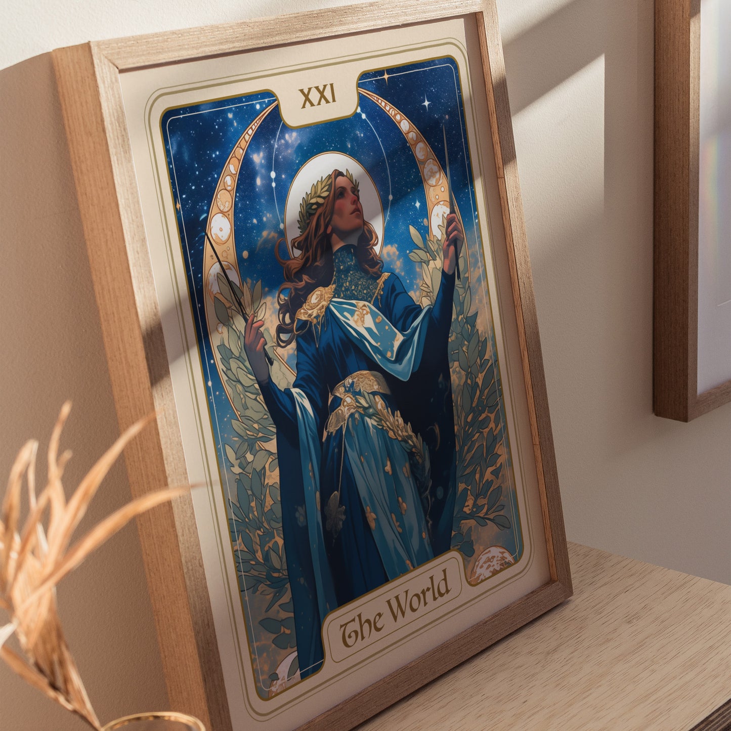 Home setting displaying framed and unframed wall art posters featuring a crowned figure amidst cosmic elements.