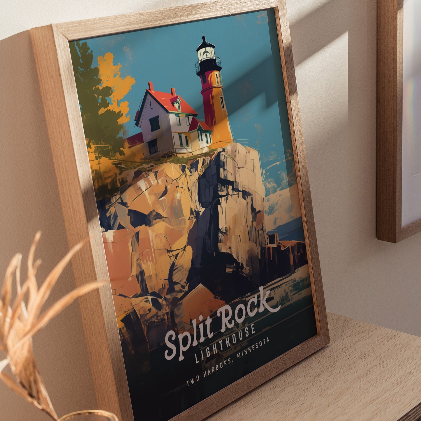 A framed poster of Split Rock Lighthouse in a vintage style, showcasing the lighthouse atop rocky cliffs under a clear sky. The text reads Split Rock Lighthouse, Two Harbors, Minnesota.
