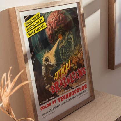 Home decor showing framed and unframed wall art posters depicting chaotic alien invasion and retro sci-fi elements.