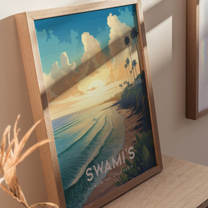 Framed artwork depicting a serene beach scene at sunset with palm trees, cliffs, and gentle waves. The text Swamis Encinitas, California is visible at the bottom.