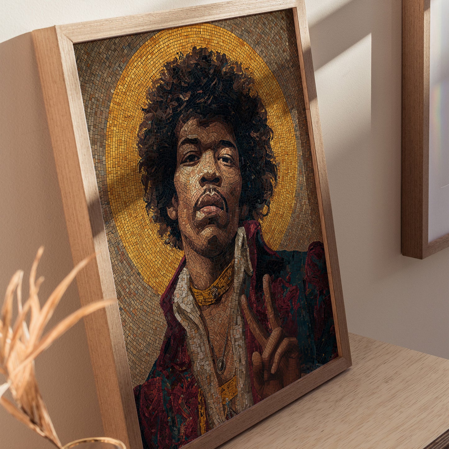 A framed mosaic portrait of a man with curly hair, wearing a red and white outfit, is displayed on a wooden shelf. The background features a golden halo effect, adding a vibrant touch to the artistic piece.