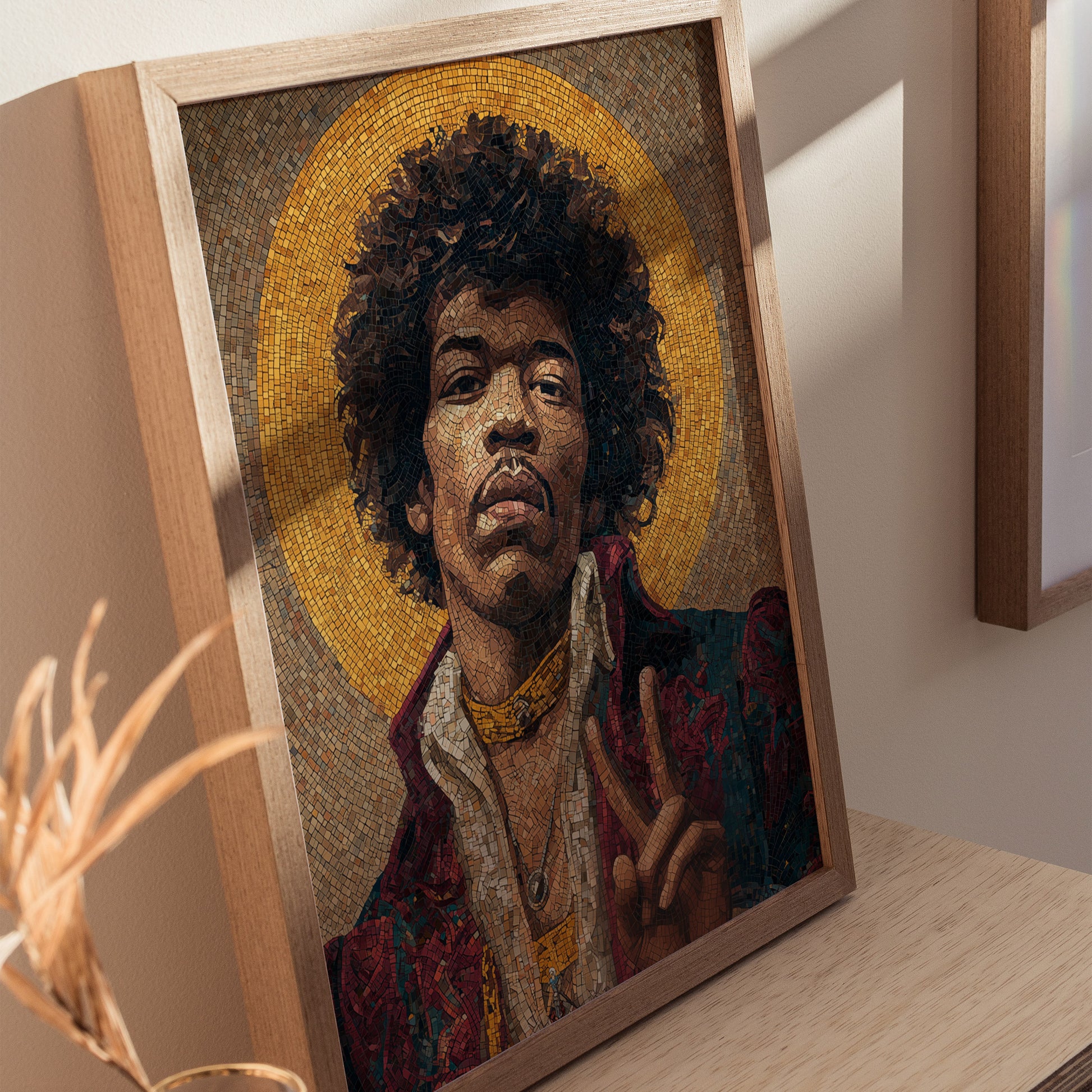 A framed mosaic portrait of a man with curly hair, wearing a red and white outfit, is displayed on a wooden shelf. The background features a golden halo effect, adding a vibrant touch to the artistic piece.