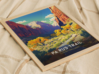Framed poster of Parus Trail, Zion National Park, featuring vibrant autumn foliage and towering red cliffs under a bright blue sky, placed on a textured beige fabric.