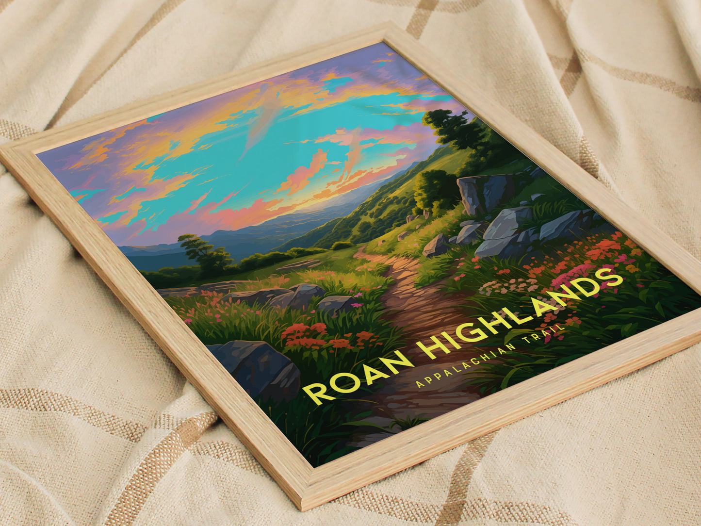 A framed poster depicting a vibrant sunrise over a scenic trail in the Roan Highlands, featuring colorful skies and lush greenery. The text reads Roan Highlands Appalachian Trail.